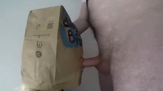 Dirty German girl blowjob with a McDonalds Paper Bag on head