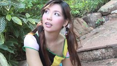 Exotic girl Ying Charintip shows off her naughty side in the outdoors