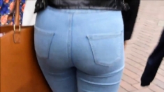 Candid blonde teen with sexy curves in jeans