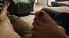 Husband's cock rubbed by his mature wife's silky feet
